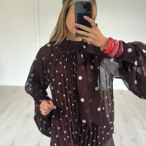 Blouse à pois plissée